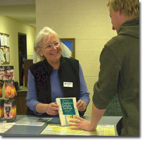 A volunteer at the visitor center